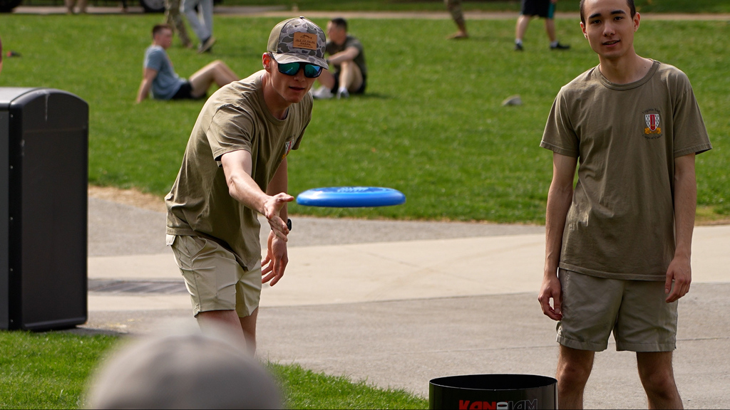 Hokies enjoy the warm weather on campus in Blacksburg