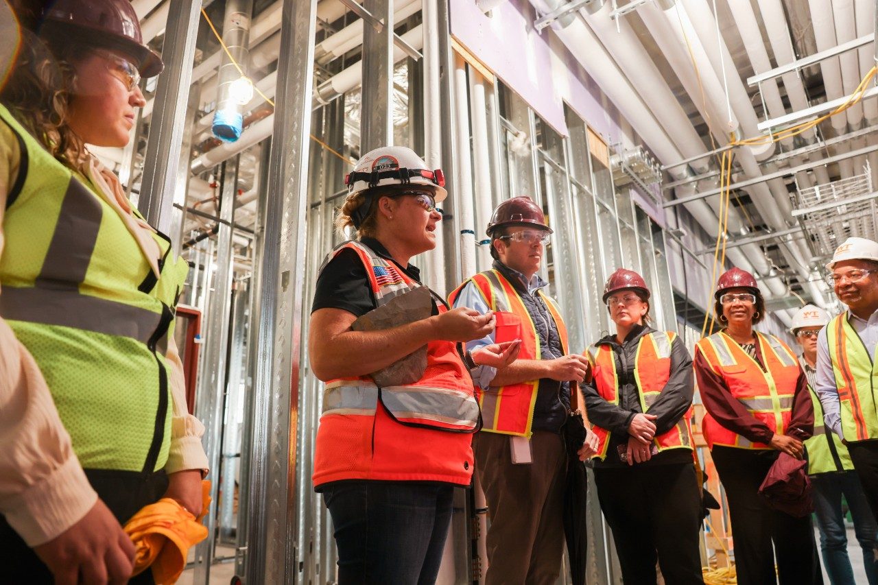 group of people at a construction site