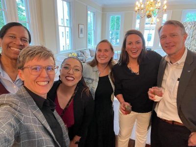 a crowd of people taking a selfie