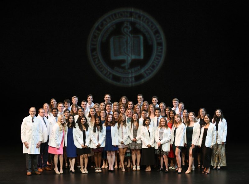 Students at a White Coat Ceremony for the medical school