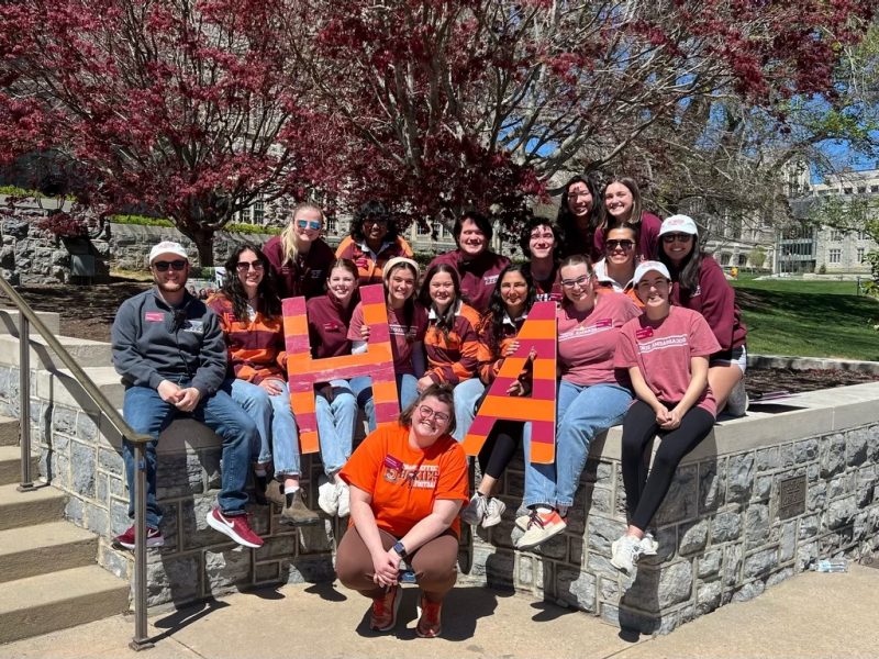 Hokie Ambassador Executive Board Hokie Ambassadors 2019-2020 Executive Board standing in front of Burruss Hall